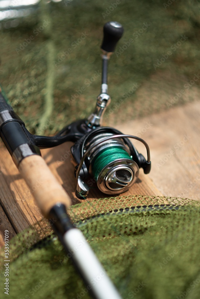 fishing rod and reel isolated