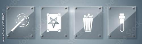 Set Bottle with love potion, Popcorn in box, Ancient magic book and Magic wand. Square glass panels. Vector.