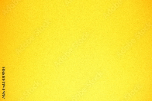Yellow Painting on Concrete Wall Texture Background.