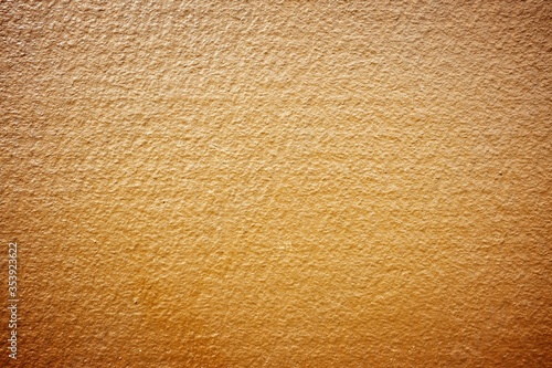 Brown Painting on Stucco Wall Background.