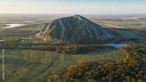 The remain of the reef of the ancient sea, composed of limestone - shikhan Yuraktau. photo