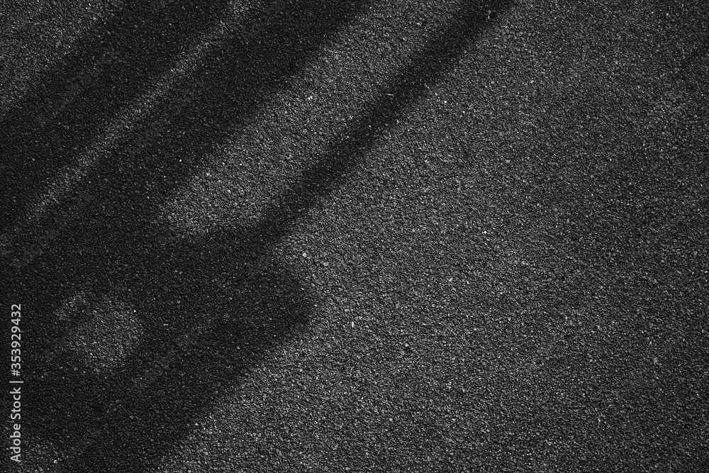 Fototapeta premium Pole shadow on Asphalt Road Background in Dark Composition.