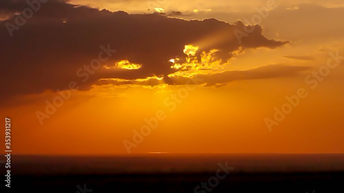 very beautiful sunset behind the clouds