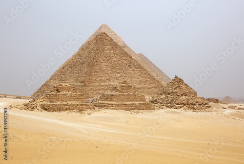 The pyramids of Giza  the Menkaure  the Khafre and the Great Pyramid