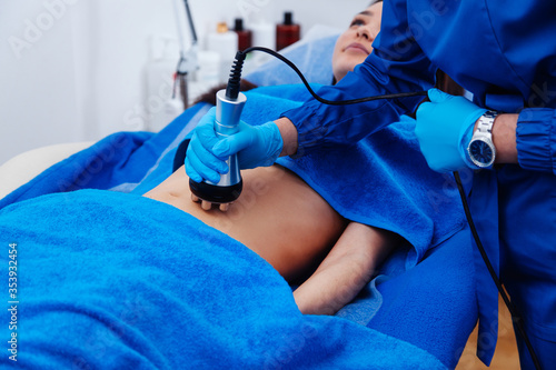 radiofrequency lifting process on the left abdomen