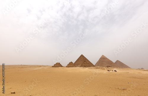 The pyramids of Giza  Menkaure  Khafre  and Khufu at Giza