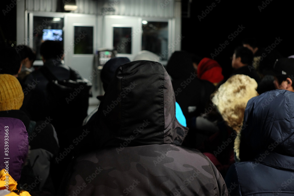 Crowded People Waiting for Hakodate Ropeway in Winter Night where is a Tourist Attraction of Hakodate, Sapporo Japan.