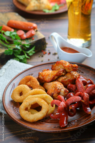 snacks with a glass of light beer