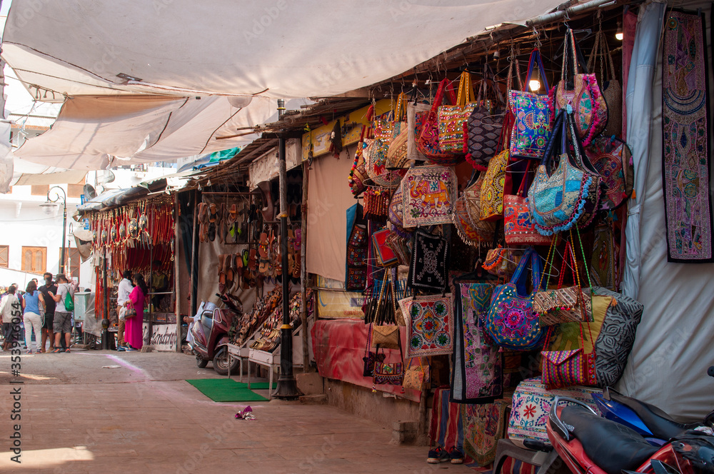 Fototapeta ladies bag selling on the street of rajasthan