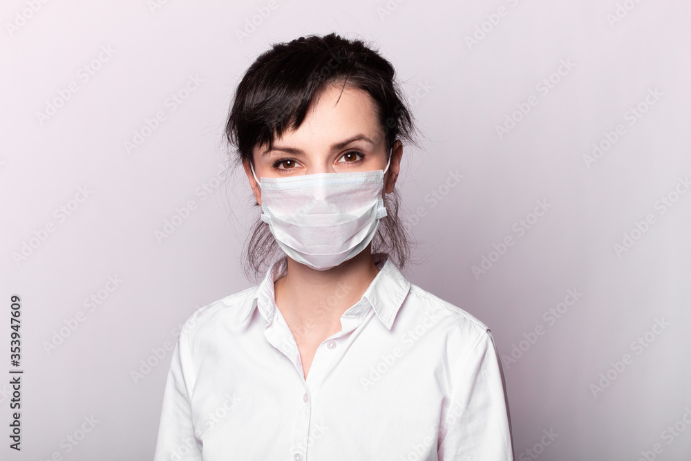 girl in a white shirt and medical mask girl in a white shirt and medical mask