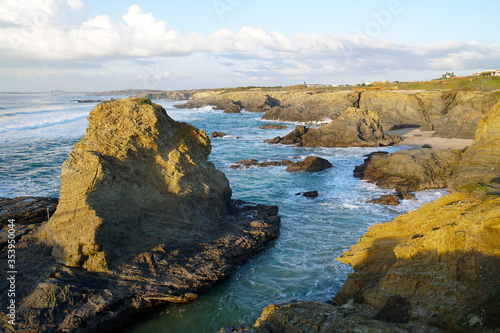 rocky cliff at typical beach at the west coast of Alentejo near Porto Covo