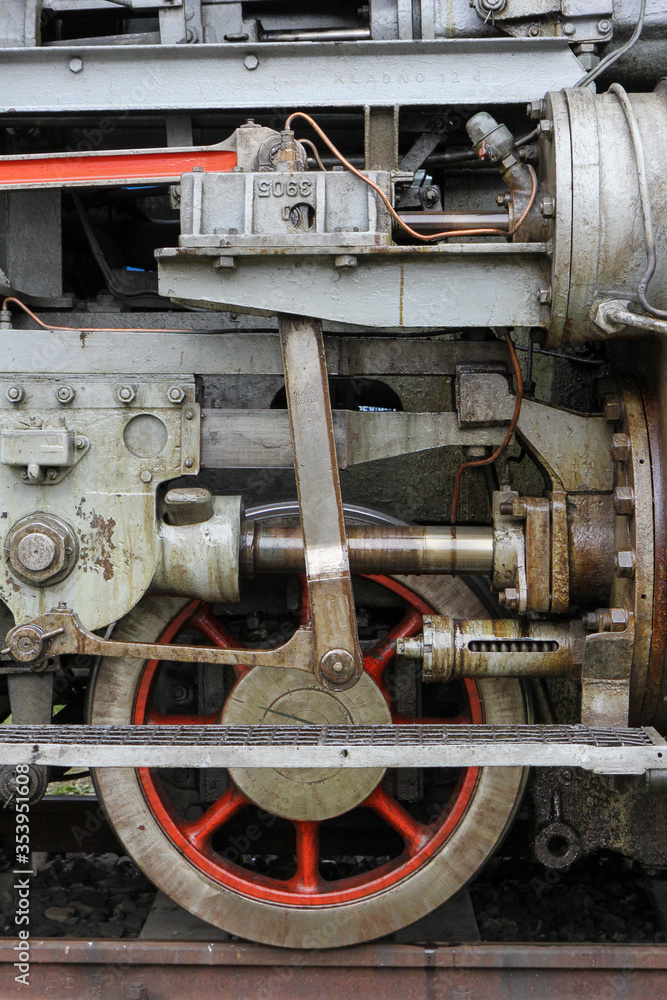 Bratislava, Slovakia. 2016/6/19. The wheel machinery of a locomotive. Exhibition of old locomotives and trains.