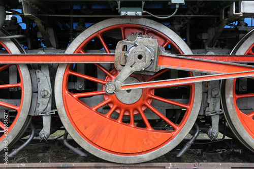Bratislava, Slovakia. 2016/6/19. The wheel machinery of a locomotive. Exhibition of old locomotives and trains.