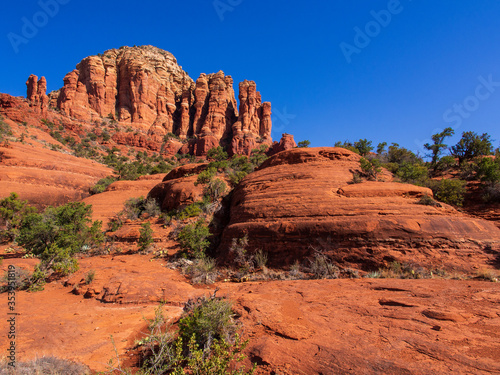 Red rocks in Sedona with clear blue sky.