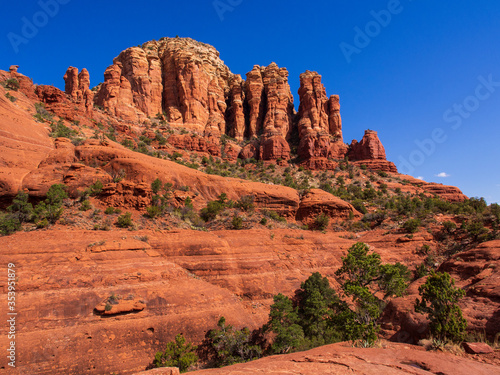 Sedona red rocks against blue sky.