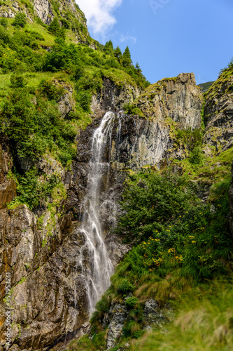 Beautiful waterfall on a summer day from Fagaras Mountains, Romania