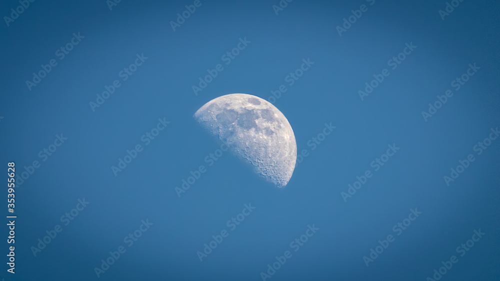 Half moon in the day sky of Spain Half moon in the day sky of Spain