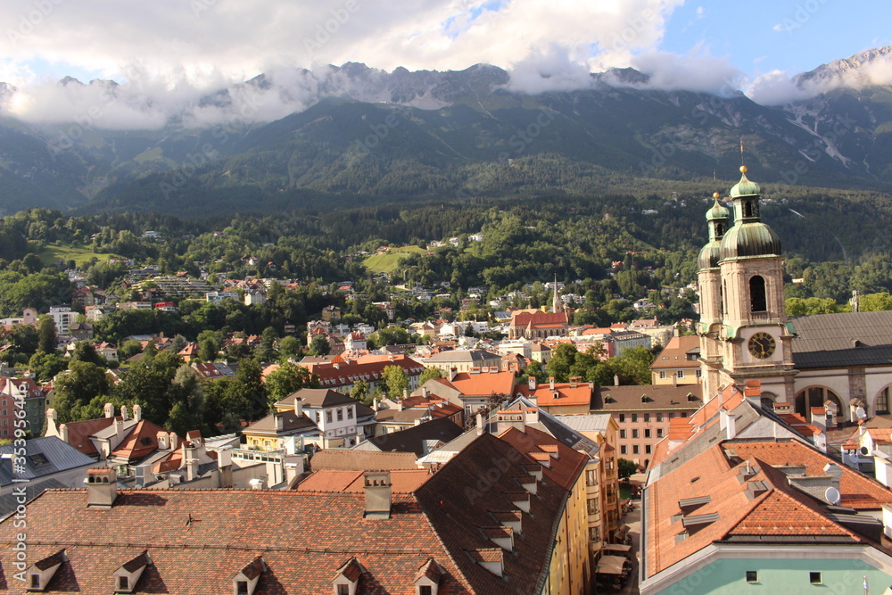 Aerial view of Innsbruck city taken from City Tower (Stadtturm) which was built in 1450 in Tirol, Austria. With 51 meters of height, City Tower is located in Old City (Altstadt or Altestadt).