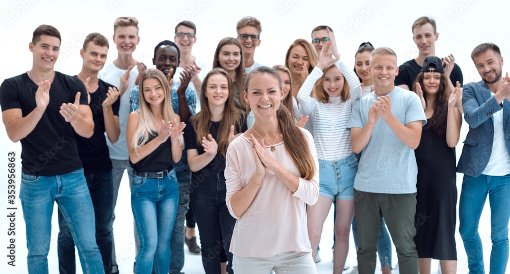 Obraz premium team of happy young people applauding together
