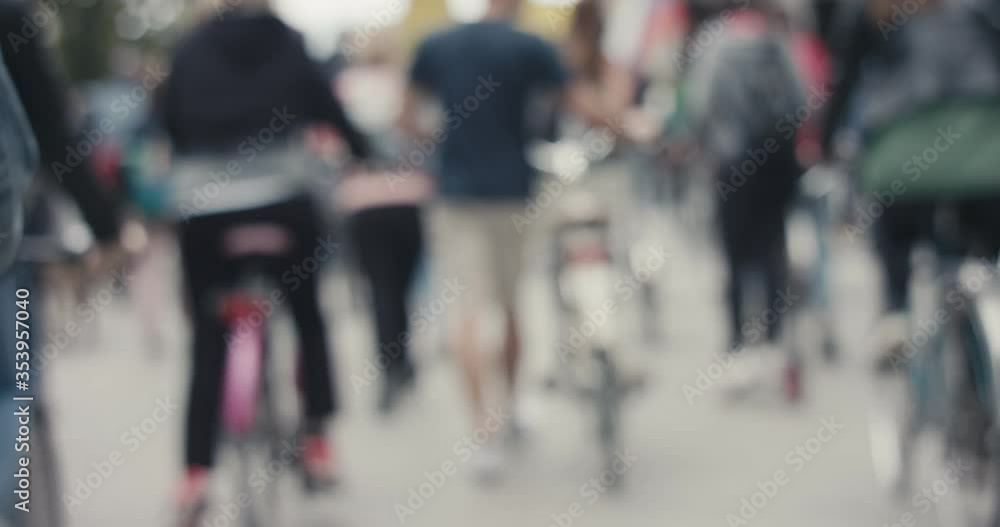 Demonstration on bicycles protest against government for protecting nature in Europe during pandemic unrecognizable blurry crowd of people Demonstration on bicycles protest against government for protecting nature in Europe during pandemic unrecognizable blurry crowd of people