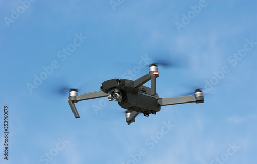 Flying Drone in a sky © krasyuk