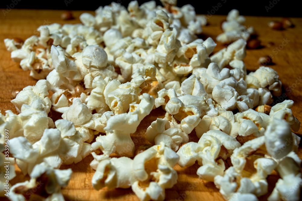 bunch of popcorn on black background bunch of popcorn on black background