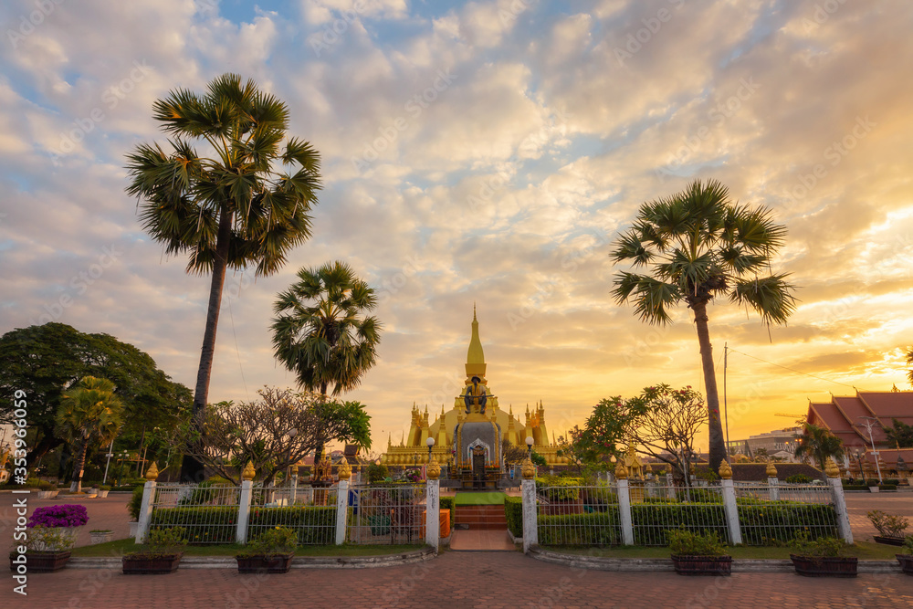 Pha That Luang Vientiane Golden Pagoda in Vientiane, Laos. sunset sky background beautiful.