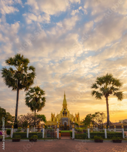 Pha That Luang Vientiane Golden Pagoda in Vientiane, Laos. sunset sky background beautiful. © Keopaserth
