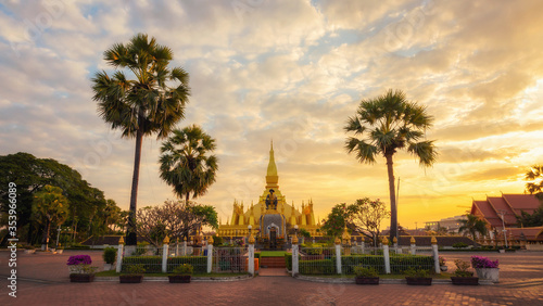 Pha That Luang Vientiane Golden Pagoda in Vientiane, Laos. sunset sky background beautiful.