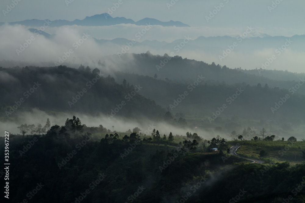 Misty morning view on the top of Puncak Lawang, West Sumatra, Indonesia, South East Asia.