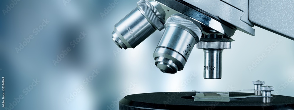 Scientific microscope with metal lens at the laboratory, Modern medical laboratory equipment Scientific microscope with metal lens at the laboratory, Modern medical laboratory equipment