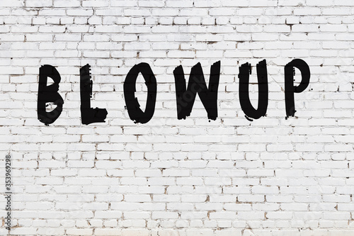 Slika na platnu Word blowup painted on white brick wall
