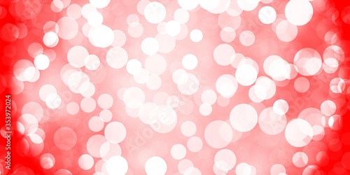 Light Orange vector background with spots.