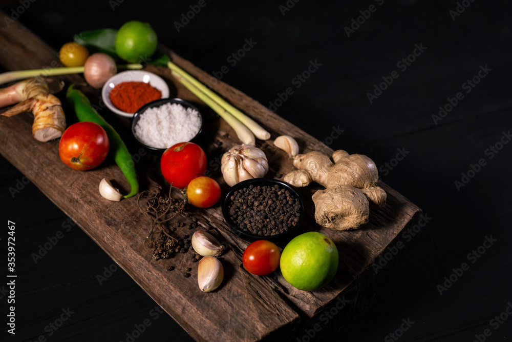 spices with ingredients on dark background. asian food, healthy or cooking concept. spices with ingredients on dark background. asian food, healthy or cooking concept.