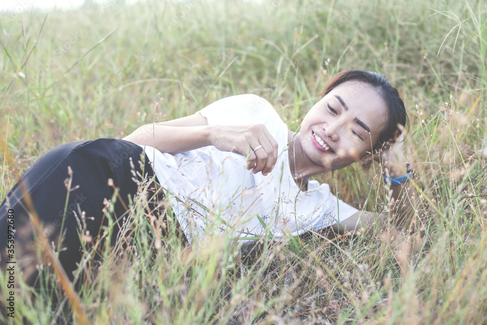 Hand of Young Woman Enjoying Nature with sunrise.