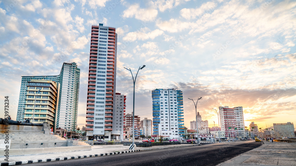 03. 03. 2020. Havana, Cuba. Sunset over the streets of the vibrant city along the sea side road also know as  El Malecon.