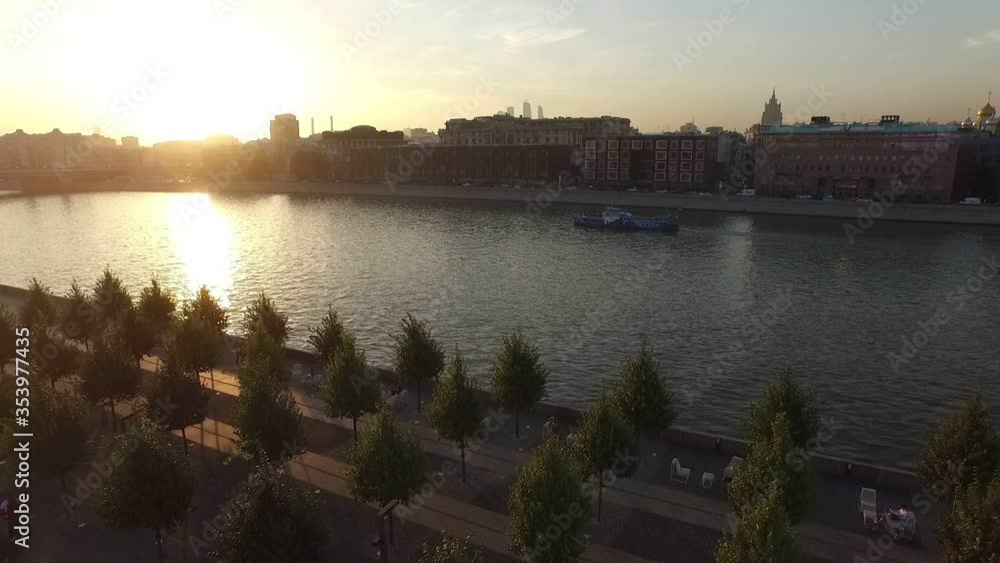 Center of Moscow, camera flight at sunset over the Moscow river and pleasure boats near Gorky Park and Krymsky bridge Center of Moscow, camera flight at sunset over the Moscow river and pleasure boats near Gorky Park and Krymsky bridge