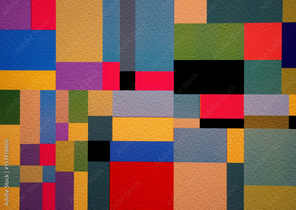 Fototapeta premium Colorful paint squares on paper abstract background.