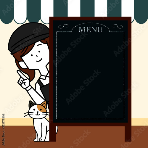 メニューの黒板から覗く女性店員
