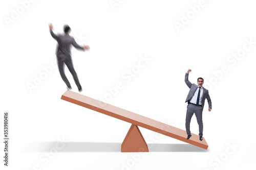 Competition concept with businessman and seesaw