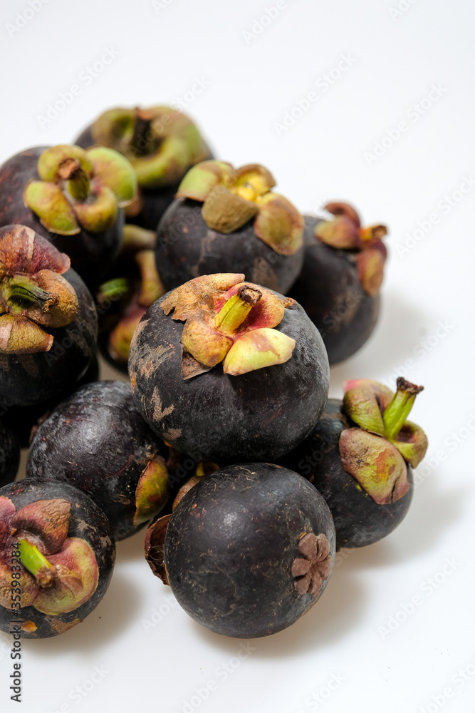 Close-Up Of Mangosteen Fruits On Table
