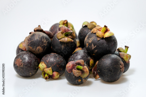 Close-Up Of Mangosteen Fruits On Table