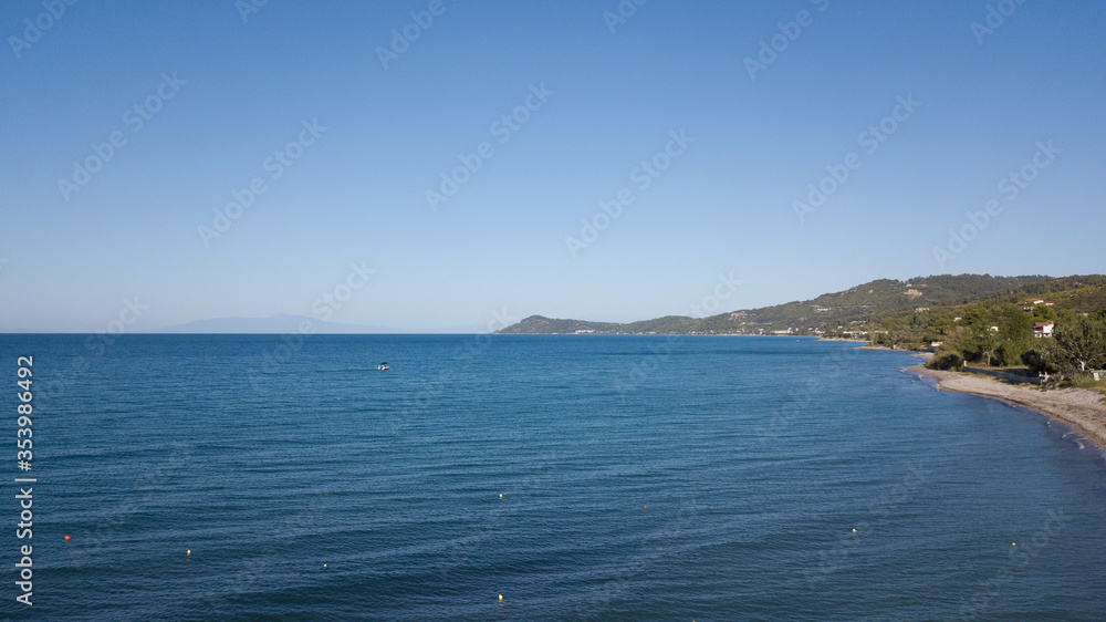 An island in the middle of a body of water An island in the middle of a body of water