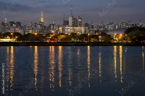 Sao Paulo, Brazil, August 13, 2013. Night view lake in Ibirapuera Park and Sky line of city in Sao Paulo
