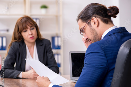 Wallpaper Mural Business meeting between businessman and businesswoman Torontodigital.ca
