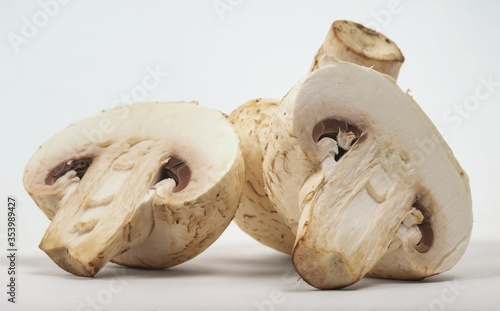 sliced white mushrooms on the white surface