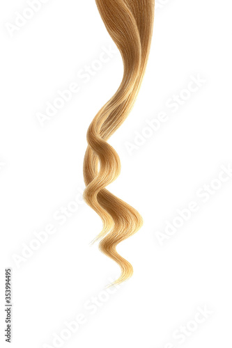Brown hair on white background, isolated. Thin curly threads
