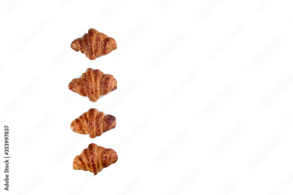 four croissants isolated on white background flat lay four croissants isolated on white background flat lay