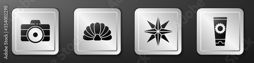Set Photo camera, Scallop sea shell, Wind rose and Sunscreen cream in tube icon. Silver square button. Vector.