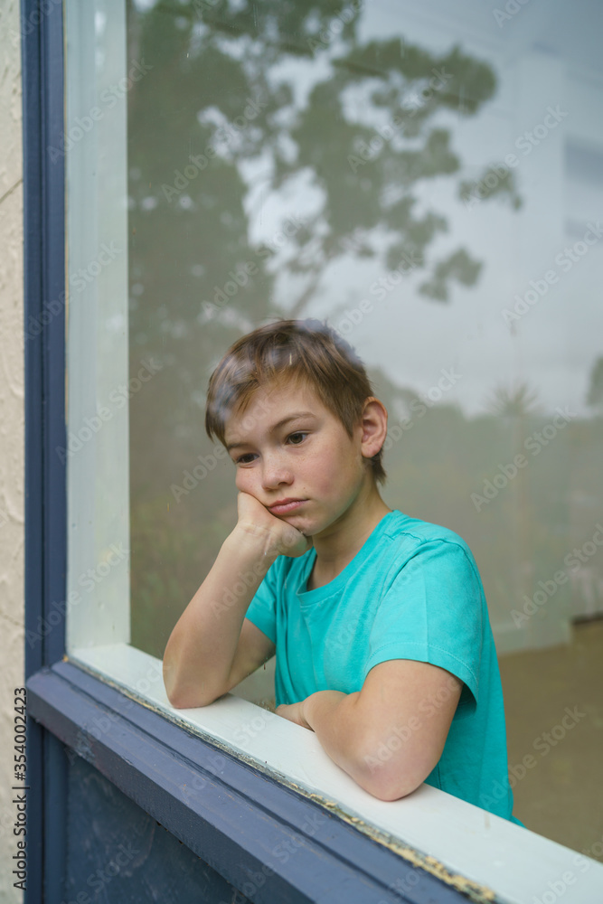 Young boy stuck at home during isolation Young boy stuck at home during isolation